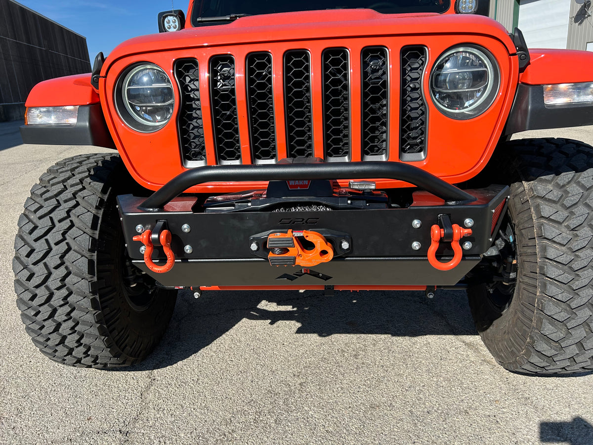 Jeep Wrangler JK, JL, and JT stubby front bumper with bull bar on orange Gladiator on 40s front