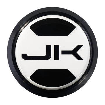 A custom round metal jeep fender badge with a unique design. Inside it has the Jeep Wrangler JK symbol. Jeep Wrangler JK fender badge, replacement for Trail Rated Badge. 